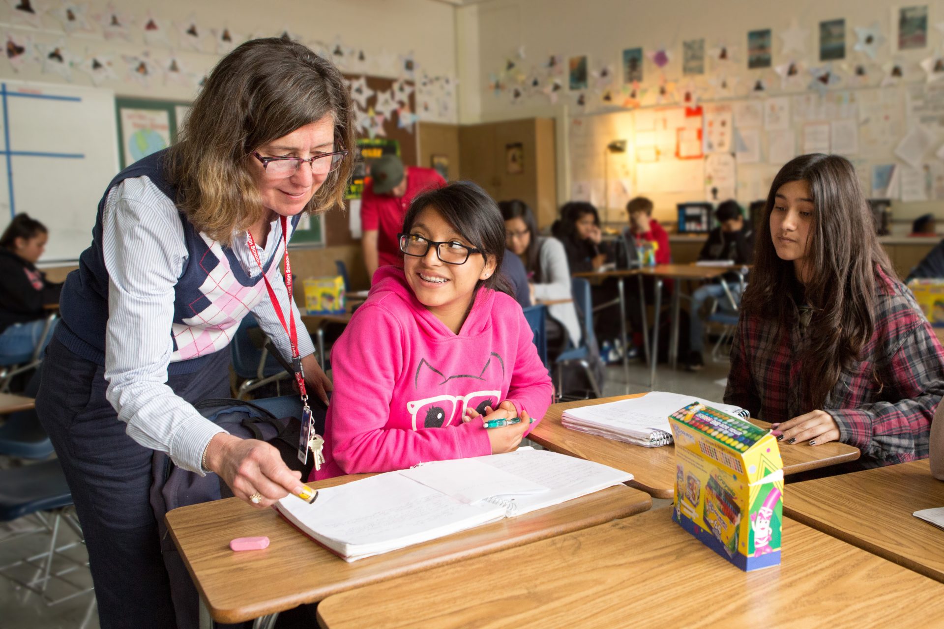 Teacher educating two young children