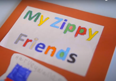 workbook with the title "My Zippy Friends" colored in with crayon